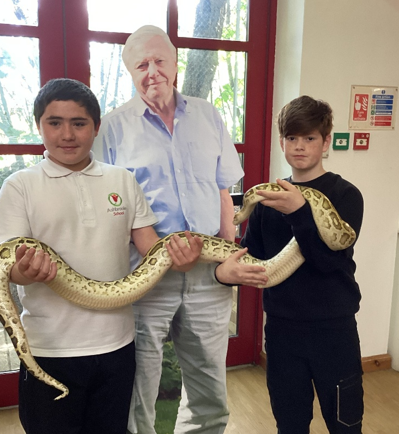 Pupils from Ashbrooke School holding snake