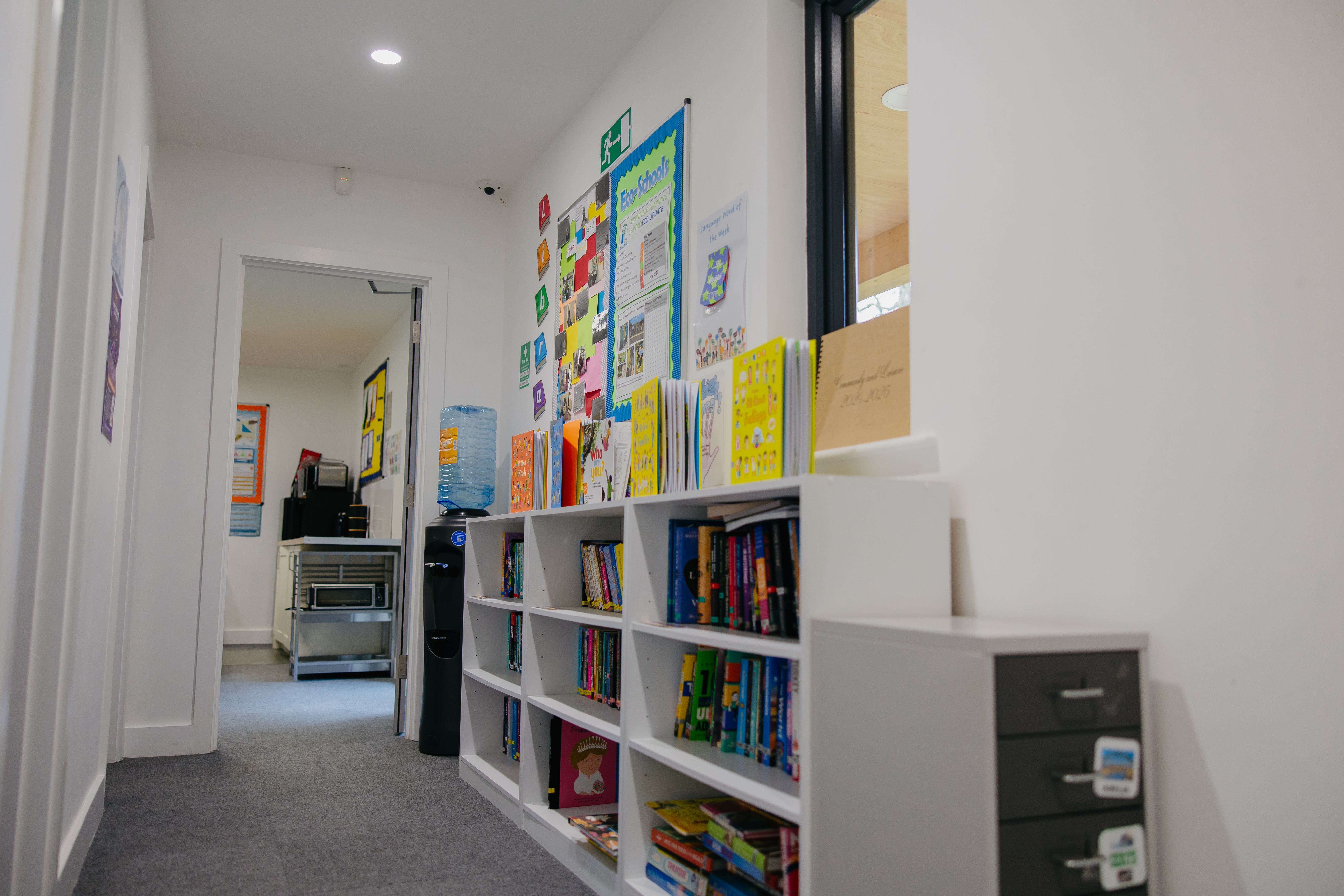 Wrenfield Learning Centre bookshelf in corridoor