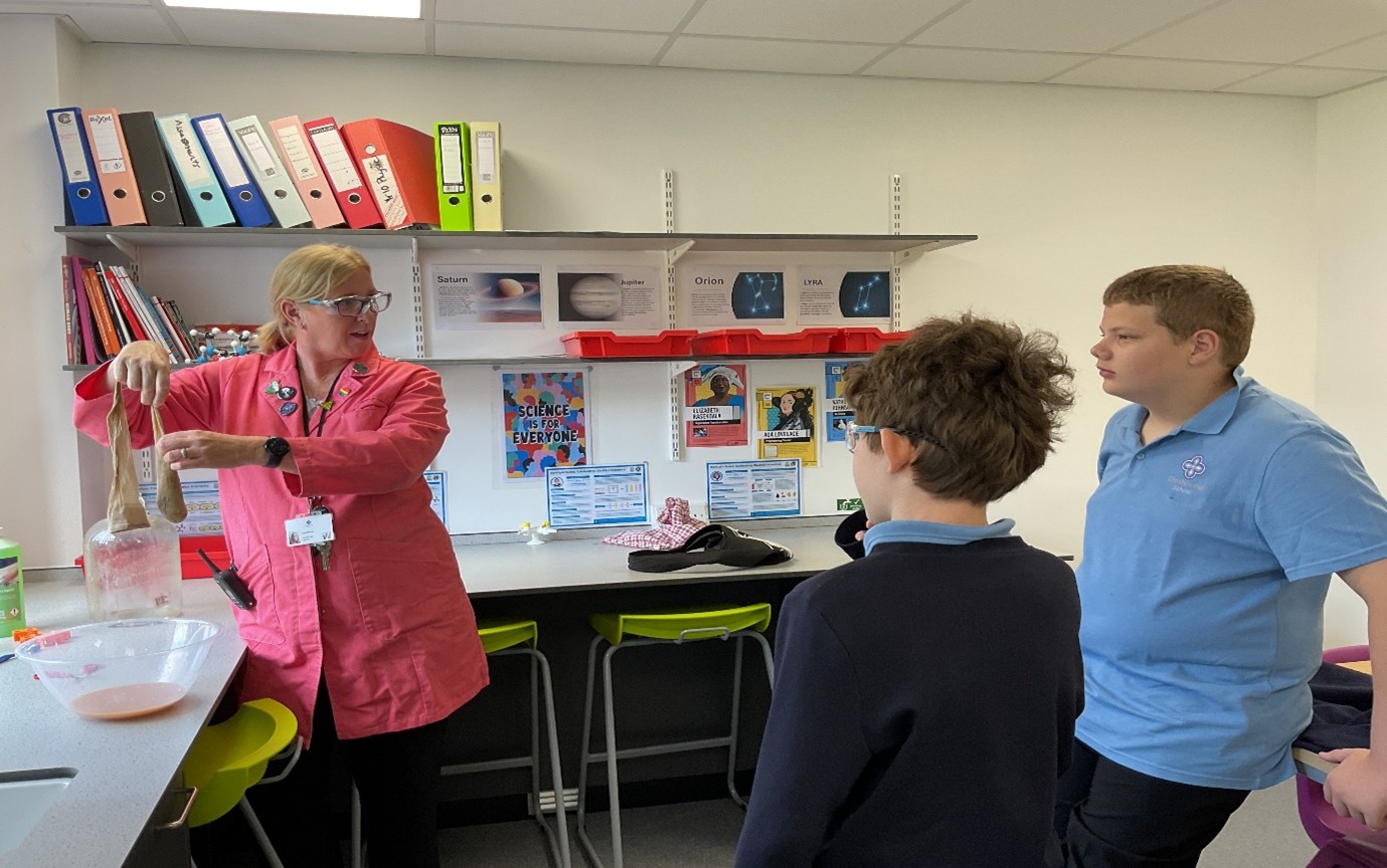 Two young boys at Cheshire Hall School learning in science lesson