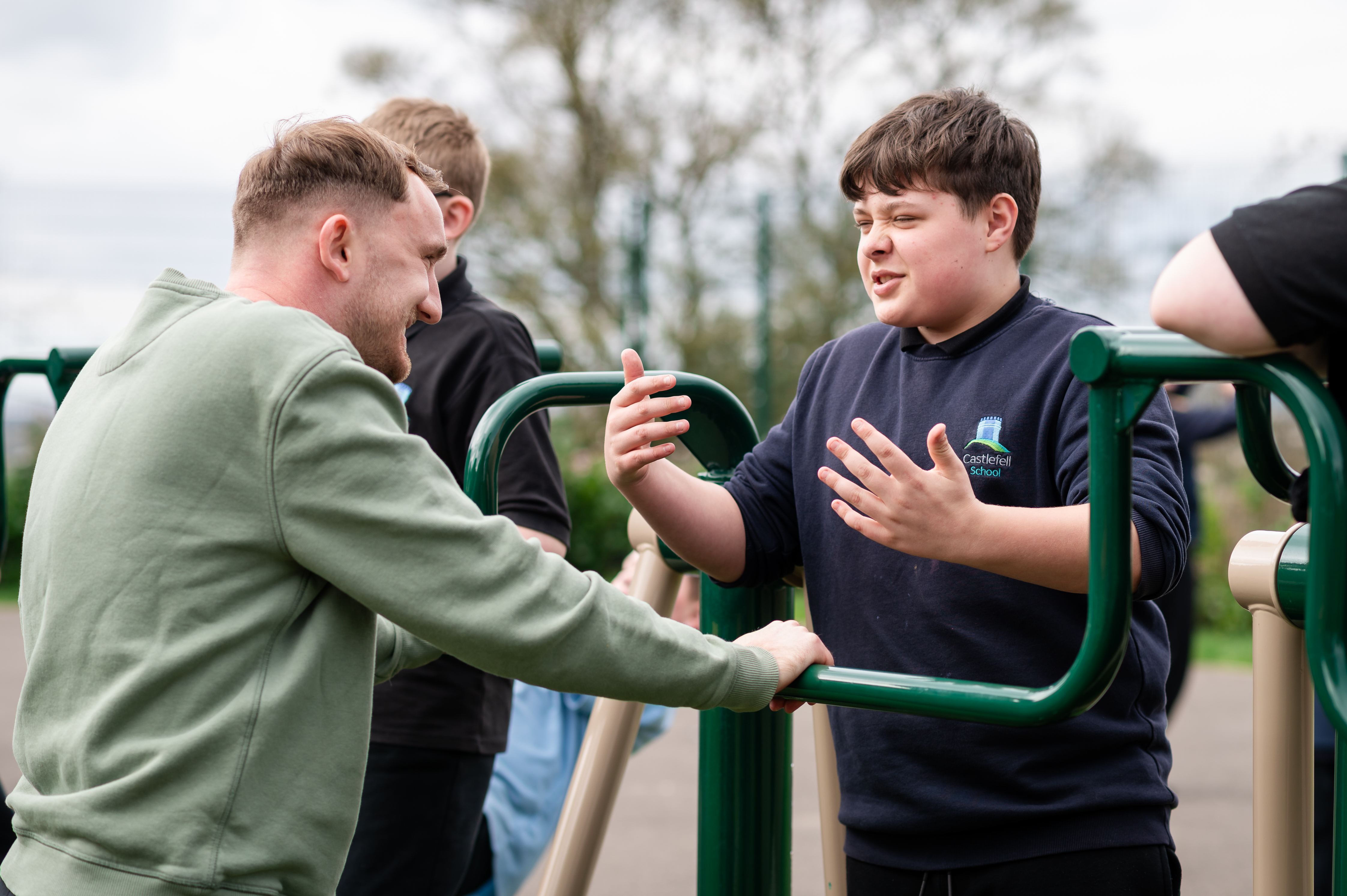 Pupil and staff meber for Castlefell School interacting