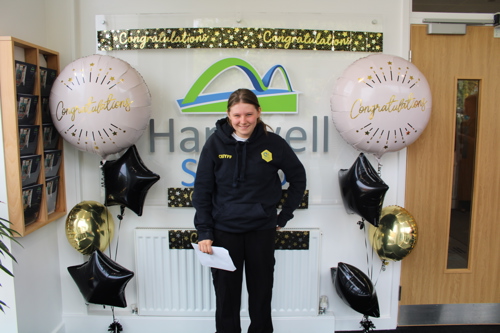 A young girl at Hartwell School getting her GCSE results