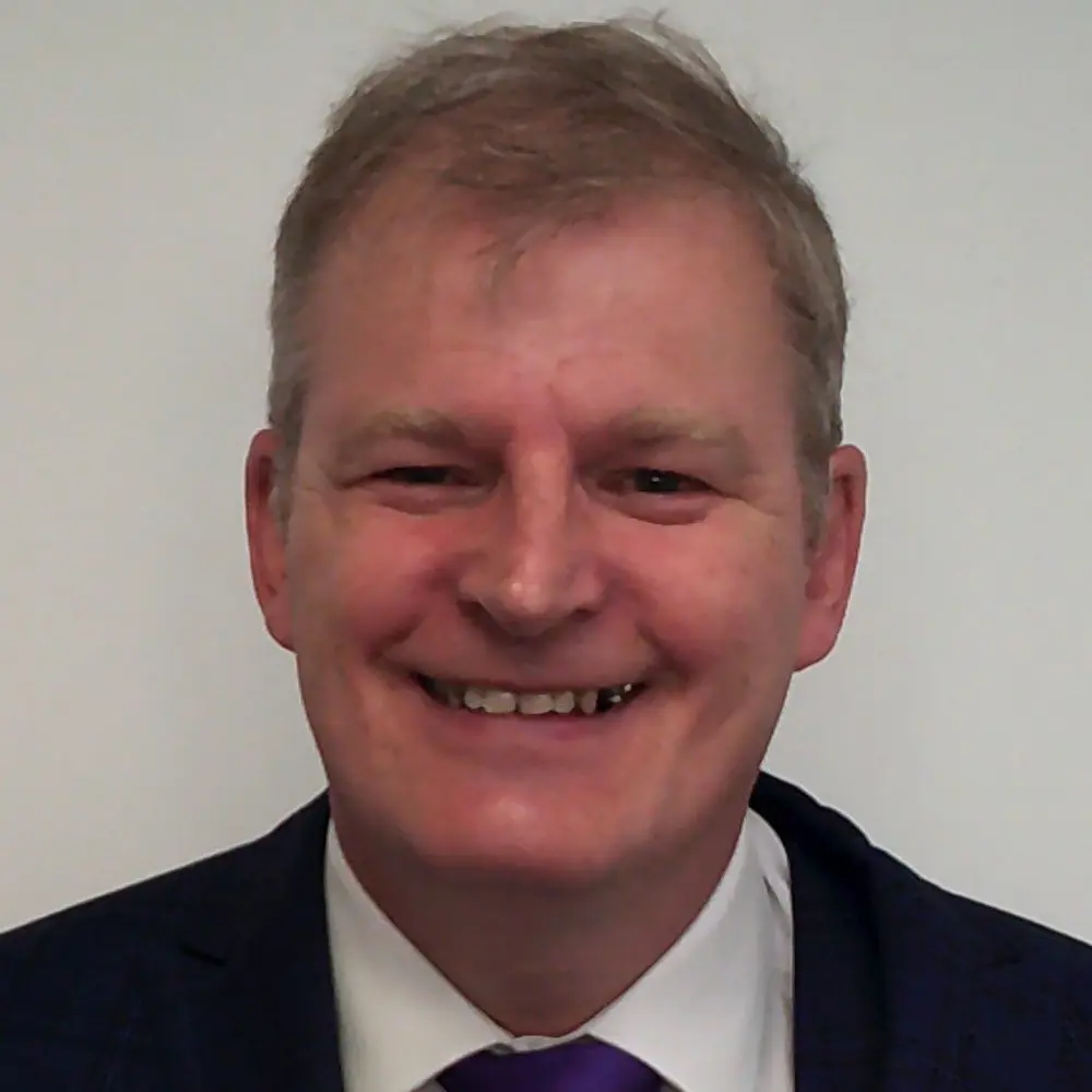 Image of Mark Fletcher, Head Teacher at Broadbeck Learning Centre wearing a suit
