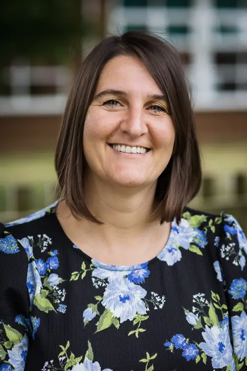 Kerri Louca-Weston, Head Teacher at Avon Park School smiling at the camera
